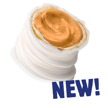 Detailed image of peanut butter stuffed white fudge covered pretzel